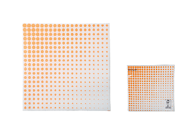 Paper napkins with neon orange coloured dots