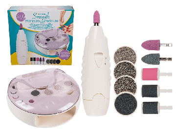 Manicure & pedicure set with integrated nail dryer